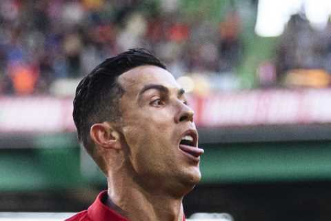 Cristiano Ronaldo scores twice to take international tally to 117 as Portugal cruise past..