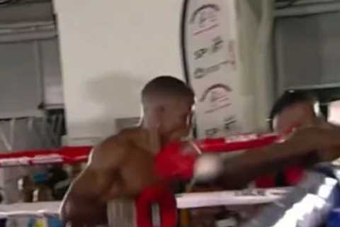 Frightening moment South African boxer Simiso Buthelezi punches invisible opponent before being put ..