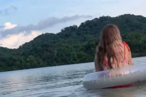Teen Mom Rachel Beaver shows off curves in bright pink bikini during lake day with daughter Hazelee,..