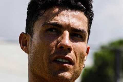 Man Utd star Cristiano Ronaldo strips down to shorts to train with Portugal team-mates ahead of..