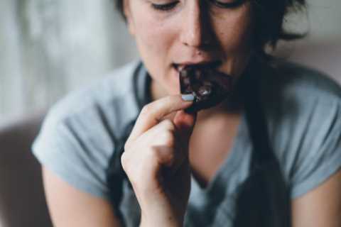 Chocolate bars and packets of crisps should be made SMALLER to help Brits lose weight, Government..
