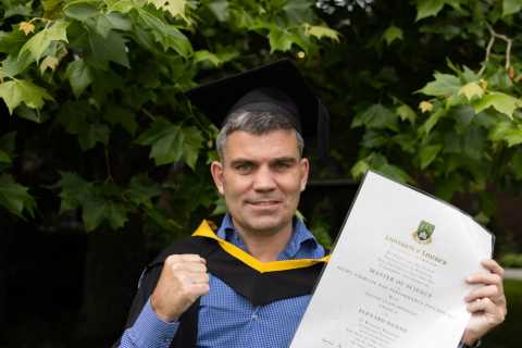Irish boxing legend Bernard Dunne all smiles as he graduates with a Masters from University of..