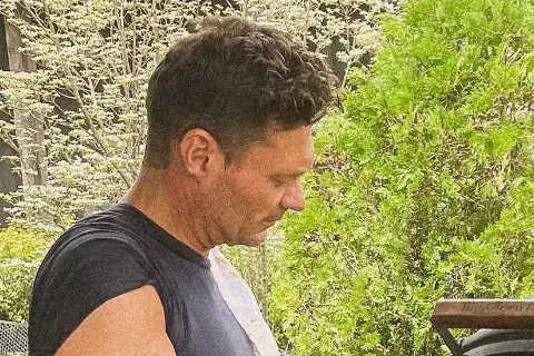 Ryan Seacrest fans lust for host as he shows off his bulging muscles in tiny tank top after..