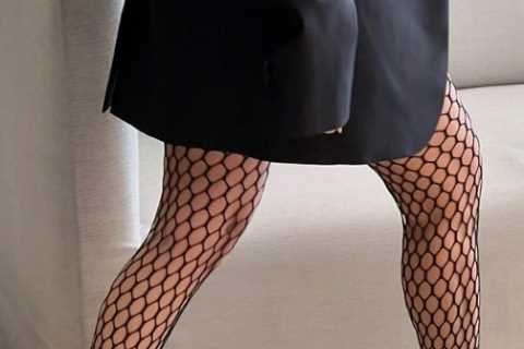 Kourtney Kardashian flaunts her long legs in new photo amid rumors she’s pregnant with Travis..