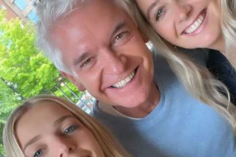 Phillip Schofield poses with stunning daughters Molly and Ruby on Father’s Day lunch at very..