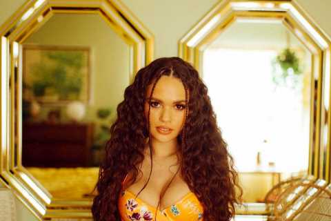 Actress Madison Pettis shows off her curls and curves for sexy lingerie shoot