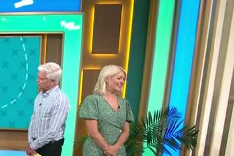 This Morning slammed as ‘irresponsible’ as queasy Holly forced to turn away during Botox procedure..