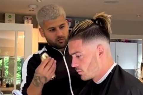 Man City star Jack Grealish shows off new top knot haircut after returning from holidays for..