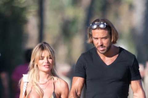 Loved up Megan Barton Hanson and James Lock back together as they hold hands in Spain