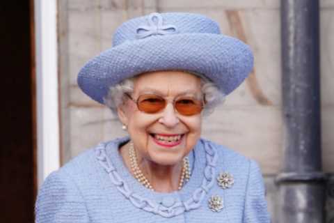 Queen, 96, beams in blue as she steps out with Prince Charles for military parade at Holyroodhouse