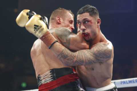 Boxer Jai Opetaia BREAKS his jaw in second round but carries on to win cruiserweight title on..