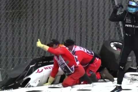 Watch heroic moment George Russell comes to aid of Zhou Guanyu after ditching Mercedes following..