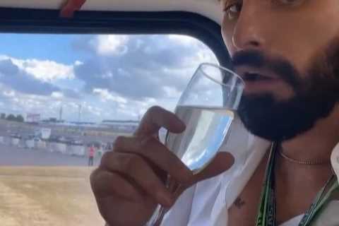 Rylan Clark sips champagne on helicopter ride after locking lips with new man