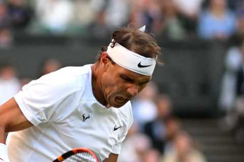 Strapped-up Rafael Nadal fights through pain to reach Wimbledon quarter-final with gritty win over..