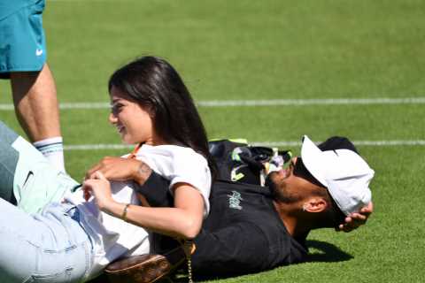 Nick Kyrgios cuddles Wag Costeen Hatzi in practice ahead of Wimbledon final as he slams Aussie..