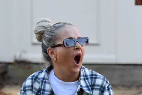 Bored Molly-Mae Hague yawns as she supports boyfriend Tommy Fury at 10k run