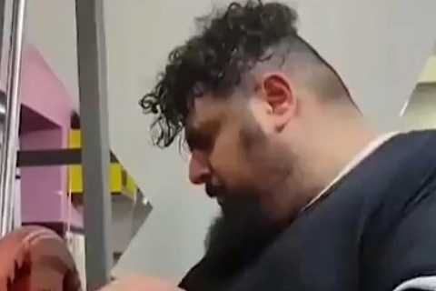 Watch Iranian Hulk in bizarre training routine for Kazakh Titan fight that includes punching a..