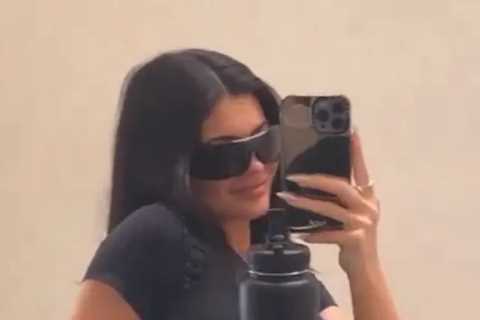 Kylie Jenner shows off her tiny waist in just a crop top just months after giving birth to baby son