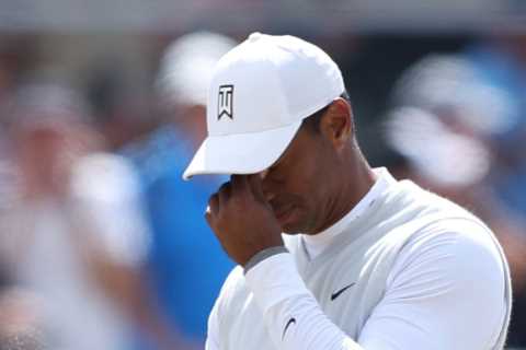 Tiger Woods in tears on 18th hole and admits he may never play St Andrews again as be battles on..