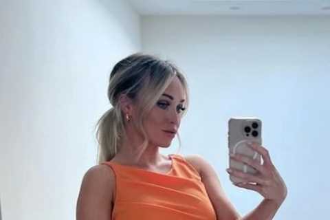 Jorgie Porter shows off baby bump in bright crop top as she celebrates engagement