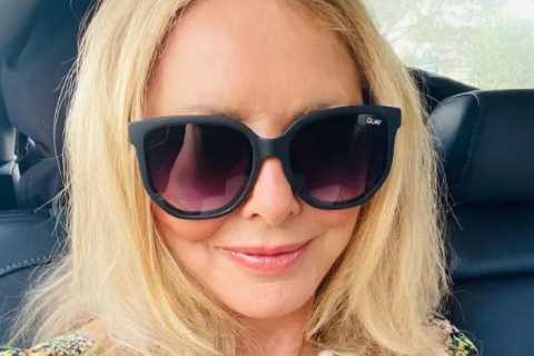 Carol Vorderman sends fans wild as she poses in lowrise dress at RAF air base