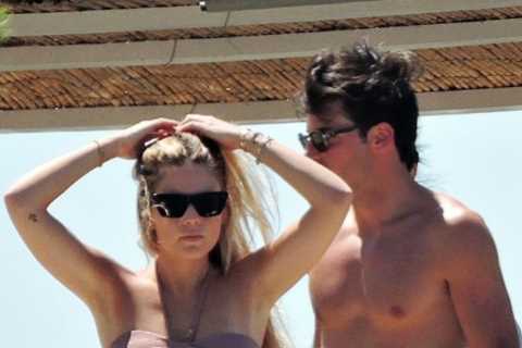 F1 ace Carlos Sainz Jr relaxes on holiday as stunning girlfriend Isabel Hernaez enjoys the sun in..