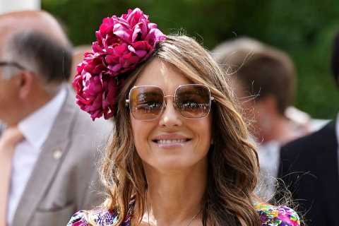 Liz Hurley shows off plunging neckline in floral dress as she shows up at Goodwood Festival along..
