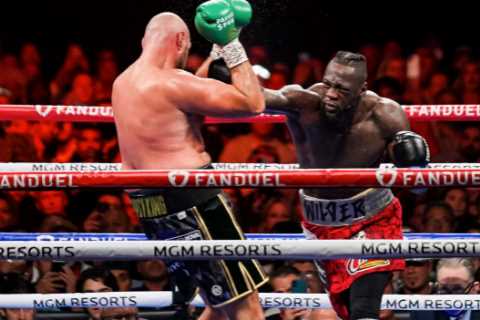 Boxing fans all saying the same thing as Deontay Wilder poses with fellow heavyweight Michael..