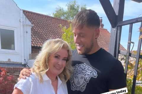 Coronation Street legend Bev Callard flashes her toned tattooed leg as she poses with a heavily..