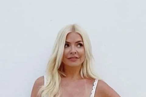 Holly Willoughby looks stunning as she shows off her new hair in a white dress on holiday
