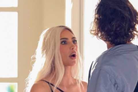 Kardashian fans shocked as they catch Kim ‘flirting’ with engaged A-lister in background of photo..
