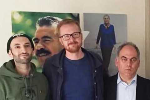 Labour MPs snapped in damning photo posing by flag of banned terror group responsible for killing..