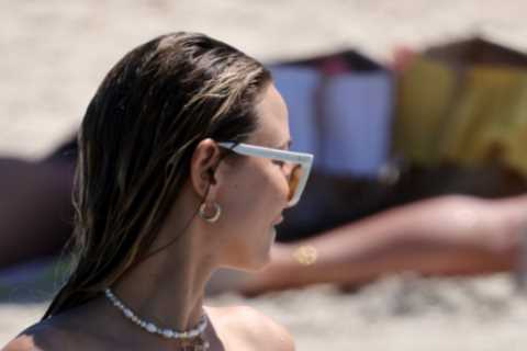 Made In Chelsea star Sophie Hermann goes topless on beach with pals in Formentera