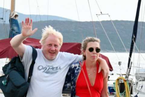 Topless Boris Johnson soaks up the sun with wife Carrie on Greece boat trip