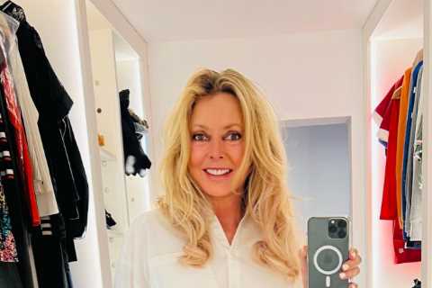 Carol Vorderman flashes her toned figure as she debuts stunning new hair