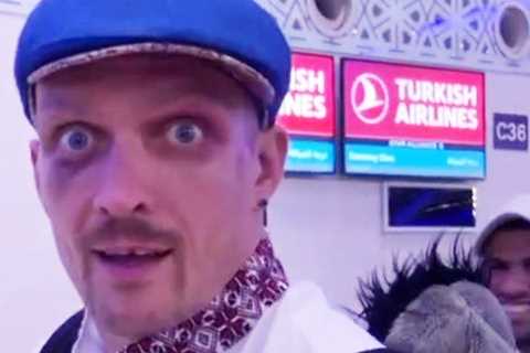 Oleksandr Usyk shows off two black eyes at airport after Anthony Joshua fight and carries emotional ..