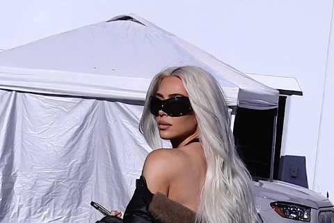 Kardashian fans think they know why Kim deleted and reposted throwback photo of herself posing in..