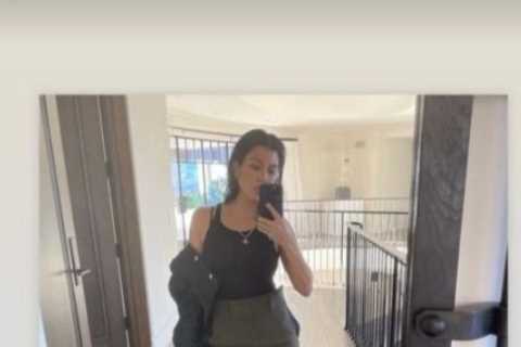 Kourtney Kardashian hides her stomach with baggy pants as fans convinced she’s pregnant with Travis ..