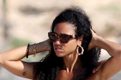 Vick Hope stuns in tiny bikini as frontrunner to be next Love Island host strolls on beach with..