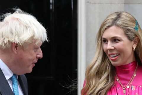 Doting Carrie Johnson holds hands with Boris as he makes final speech outside Downing Street