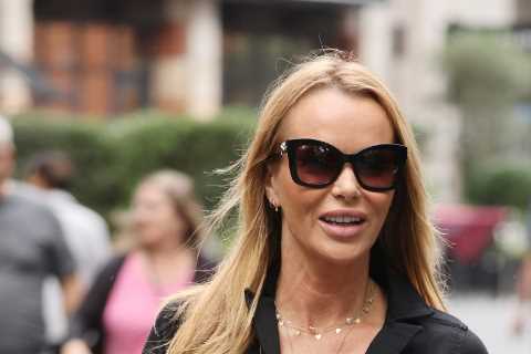 Amanda Holden looks chic in a plunging jumpsuit after her dress burst open after ‘too much wine’