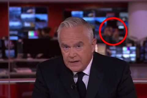 Watch shock moment BBC staffers take PHOTOS in background of Queen’s death announcement by..