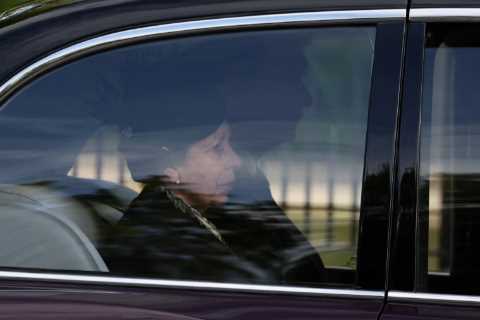 Emotional Princess Anne looks sombre as she and her husband Admiral Sir Tim Laurence accompany the..