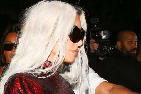 Kim Kardashian shows off her thinner-than-ever waist &amp; legs in skintight red catsuit at..