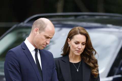 Princess Kate and Prince William greeted by mourners as they arrive at Sandringham to see tributes..