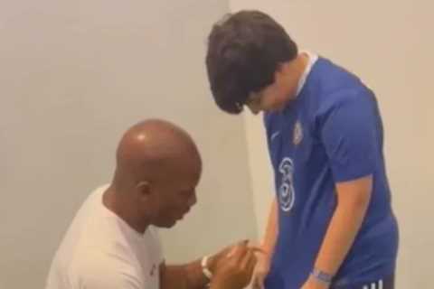 Watch hilarious moment young fan gets Chelsea shirt signed by Didier Drogba before whipping it off..