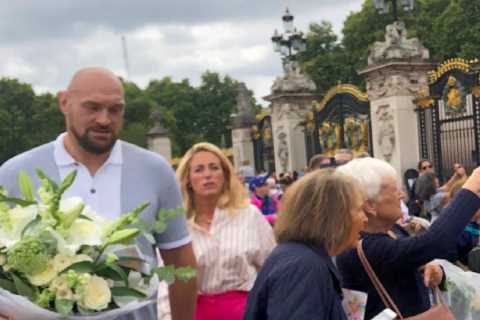 Tyson Fury and wife Paris in sweet tribute to The Queen as they lay flowers at the gates of..