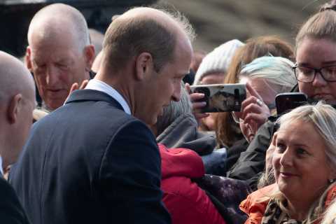 Sweet moment Prince William reassures well-wisher Queen’s Corgis are being well looked after as he..
