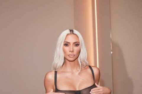 Kim Kardashian stuns as she shows off her bare boobs in see-through SKIMS bra- but fans spot..