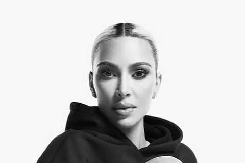 Kim Kardashian shows off her bare butt in leather thong bodysuit and thigh-high boots for racy..